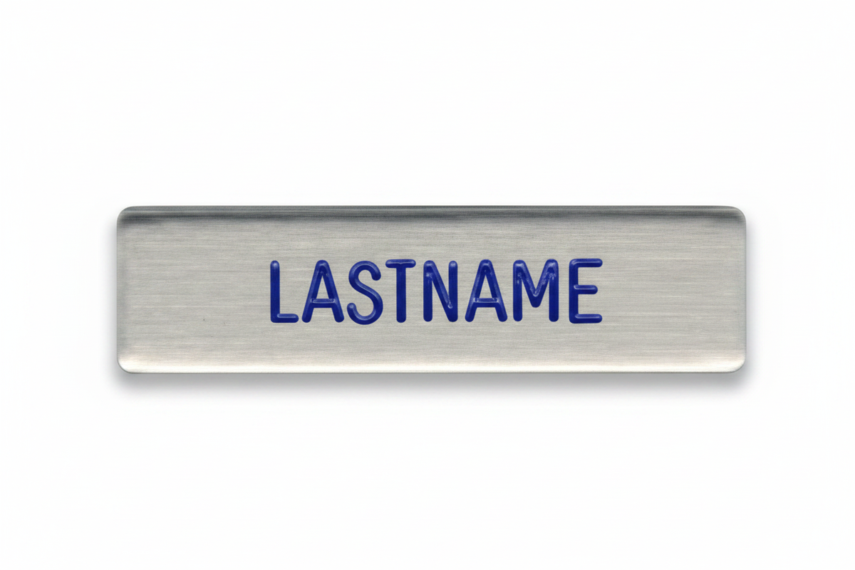 Air Force Brushed Steel Name Plates with silver brushed metal finish, rounded edges, and blue engraved LASTNAME text
