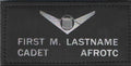 Set of 2 AFJROTC black leather flight badges with authentic insignia embossed, durable and uniform-ready.