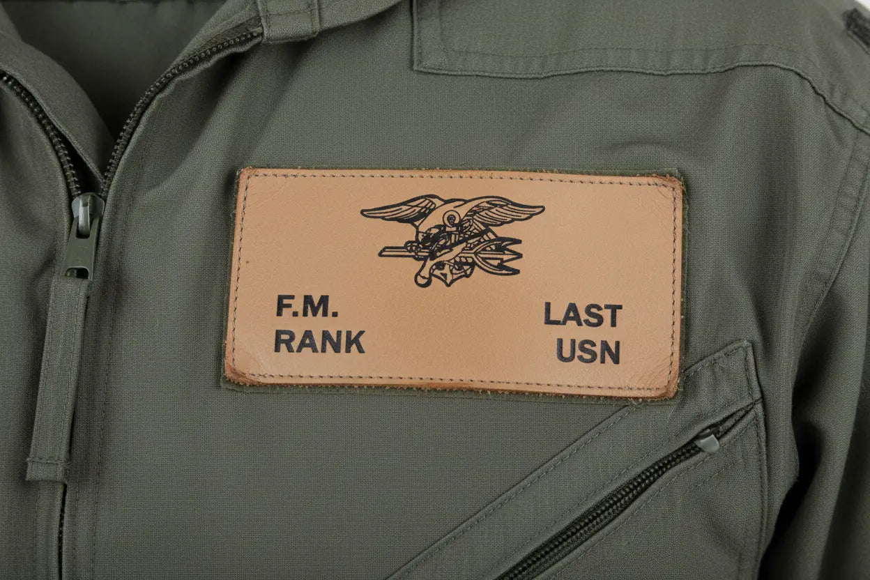 US Navy Tan Leather Badge over Left Breast on Green Flight Suit